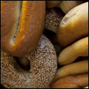 Bagels and seeded loaves on the rack